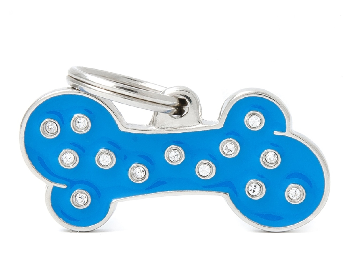 XAPA IDENTIFICATIVA OS GRAN STRASS BLAU Embellides amb brillants “made with Swarovski elements”.&nbsp;