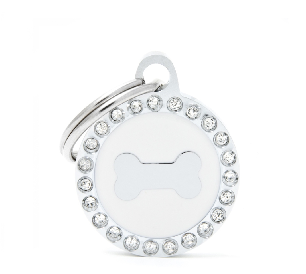 XAPA OS BLANC CERCLE STRASS Esmaltades a mans, en bronze i embellides amb brillants resplandecientes. 