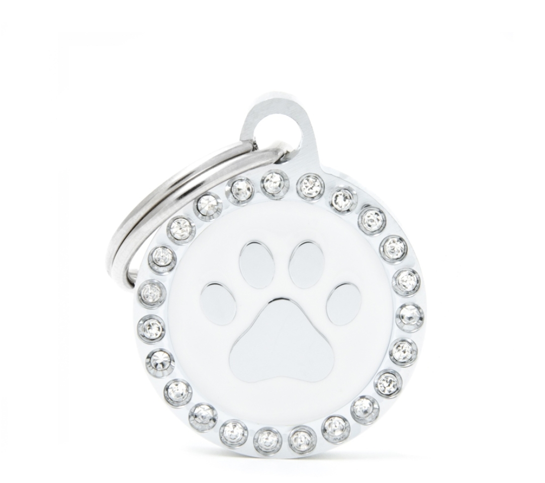 XAPA POTA BLANC CERCLE STRASS Esmaltades a mans, en bronze i embellides amb brillants resplandecientes.&nbsp;