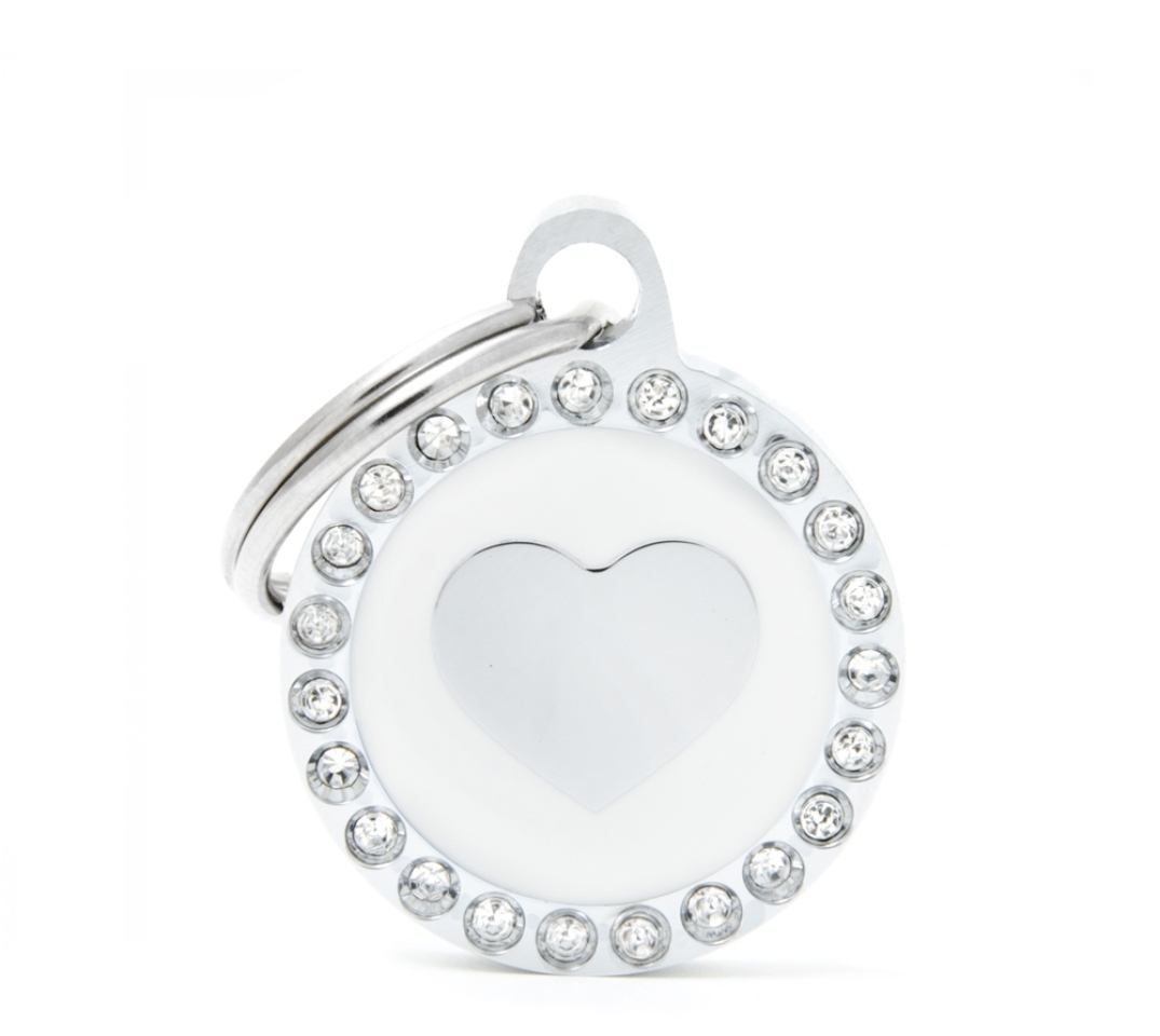 XAPA CORAZON BLANC CERCLE STRASS Esmaltades a mans, en bronze i embellides amb brillants resplandecientes  
