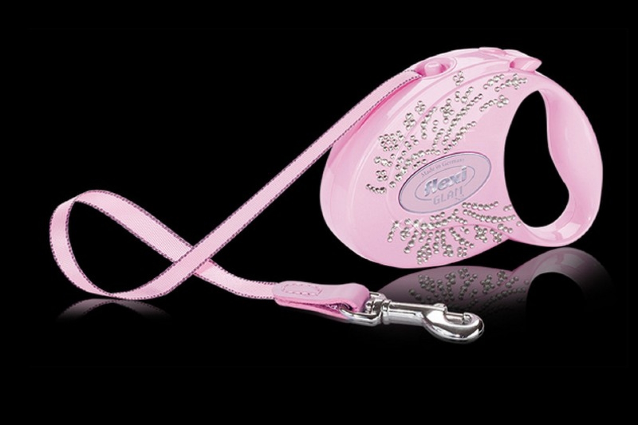 Exclusiva Corretja Extensible Flexi Glam Wings Rose-Pink. Corretja de cinta de 3 m. Per a gossos de fins a màxim 12 kg. Ennoblida amb cristalls SWAROVSKI® ELEMENTS. Color de la carcassa: Rose-Pink