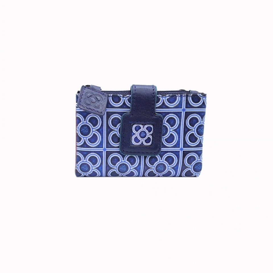 Cartera moneder confeccionada en pell flexible pintada a mà. Disponible en blau, vermell, negre i verd.